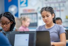 Photo of middle school students working on computers in classroom